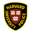 Harvard University Police Department shield, featuring a veritas shield surrounded by a thick black border.