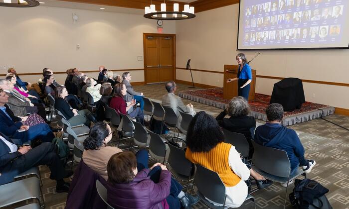 Sheila Heen addressing a crowd at Harvard Law School. 