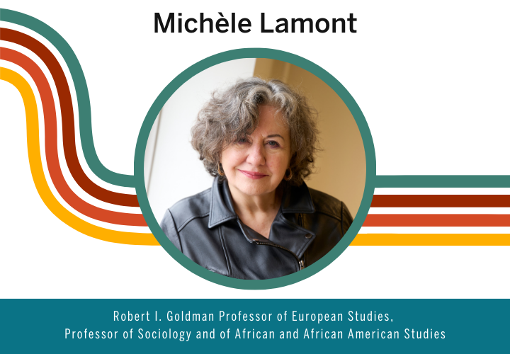 Michele Lamont with should length, curly silver hair, wearing a black leather jacket.